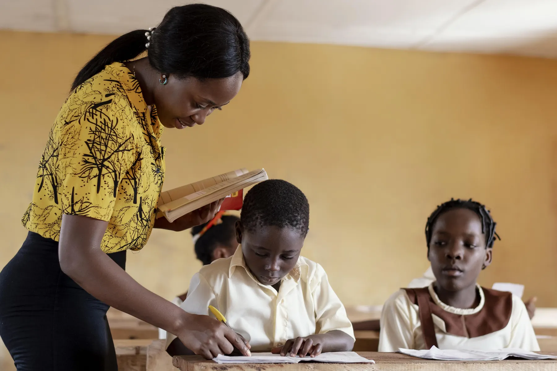 Learners working together in a Sierra Leonean classroom