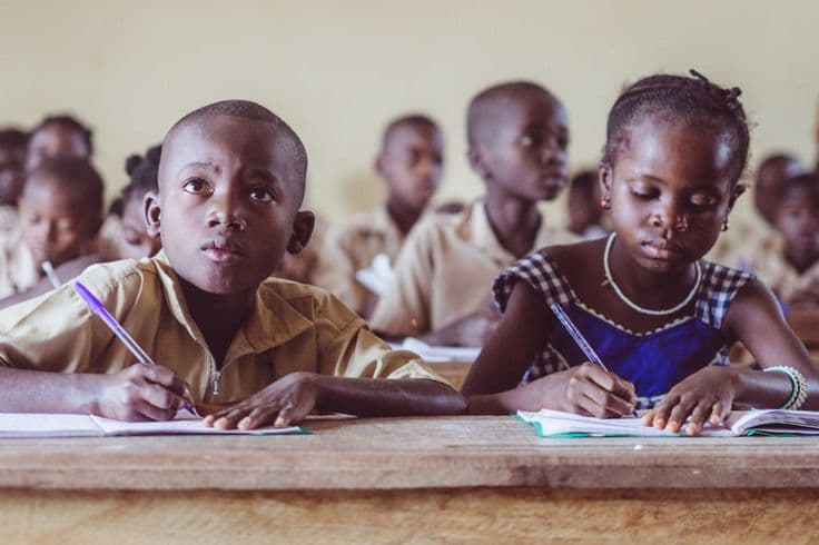 Learners writing during a classroom exercise